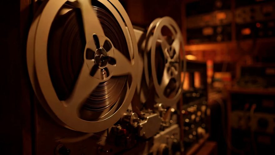 Still from the “Keep the Tape” music video — the duo’s reel-to-reel tape