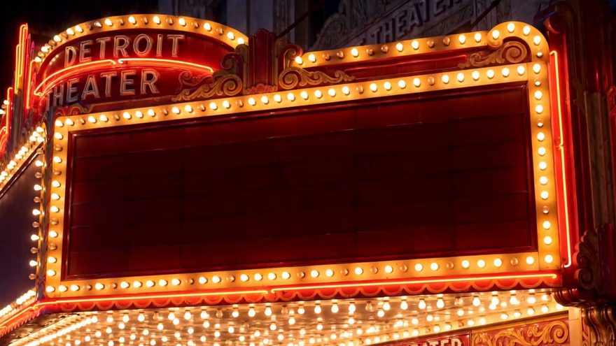 Still from the “Twirl Once” music video — the Detroit theater marquee