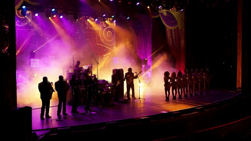 Still from the “The Split” music video — Julius Frost’s revue stage